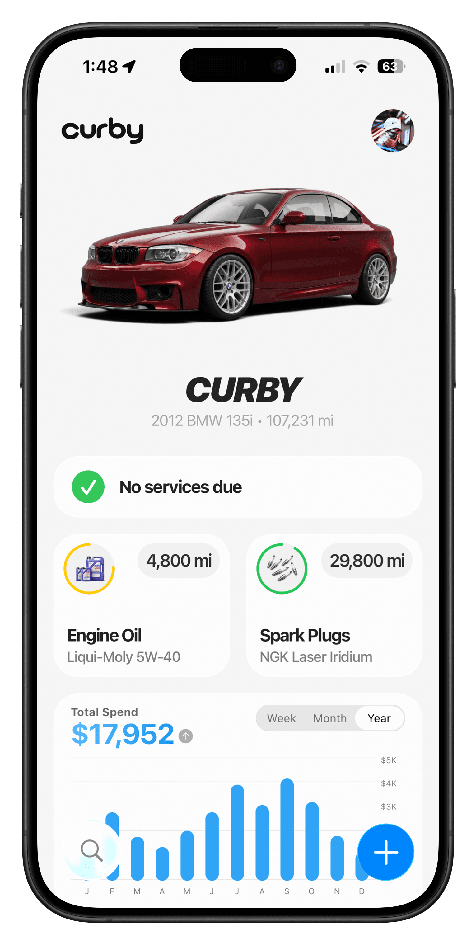 Curby vehicle detail screen showing the red BMW 135i and service dashboard in an iPhone frame